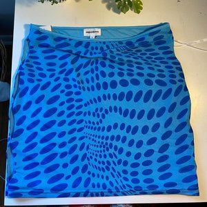 Blue skirt with oval cutouts on each side